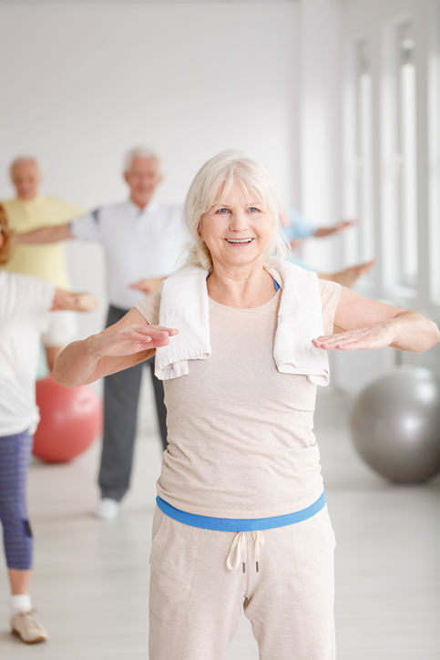 elderly-woman-gym-stretching